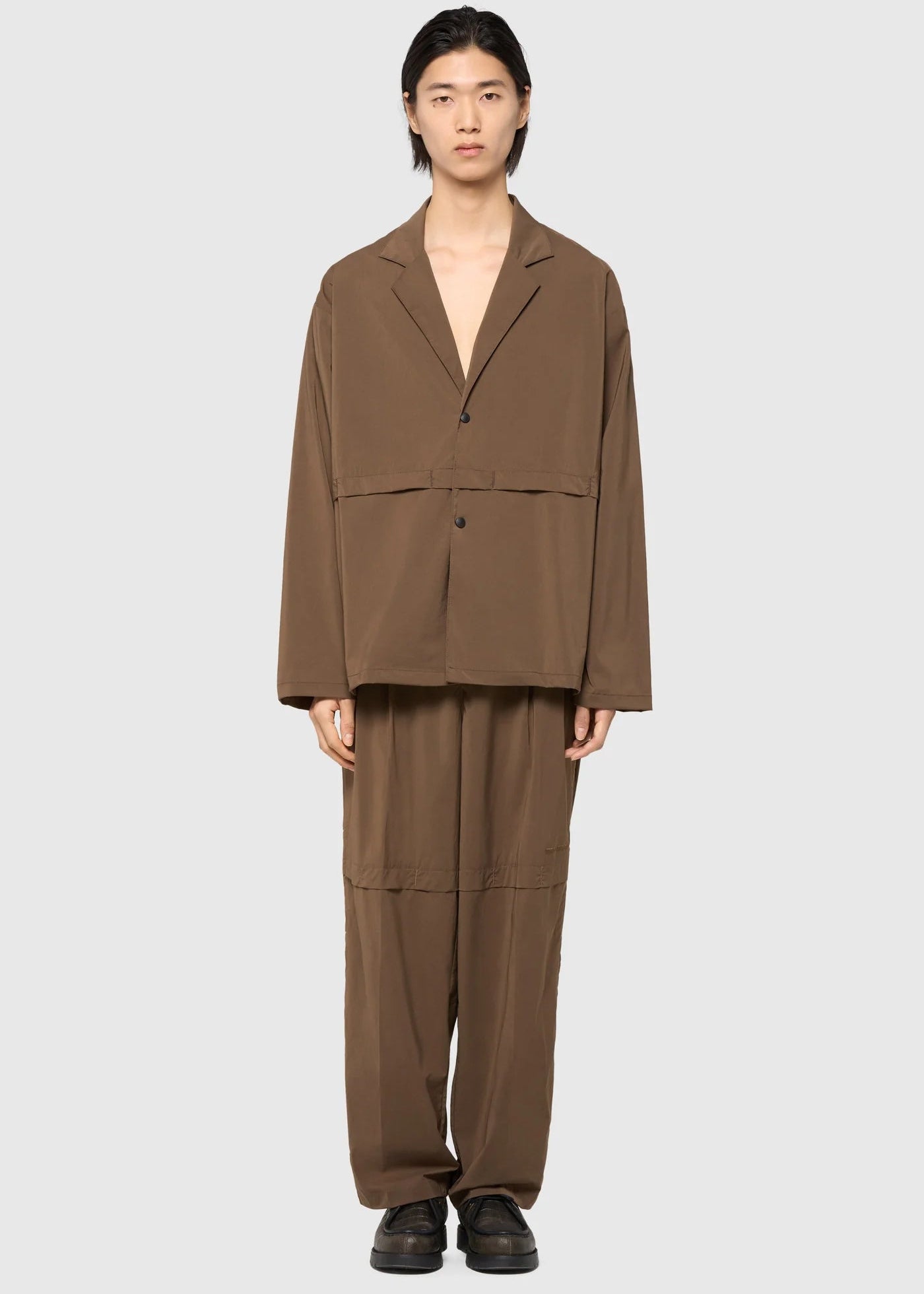 Sand pleated trousers